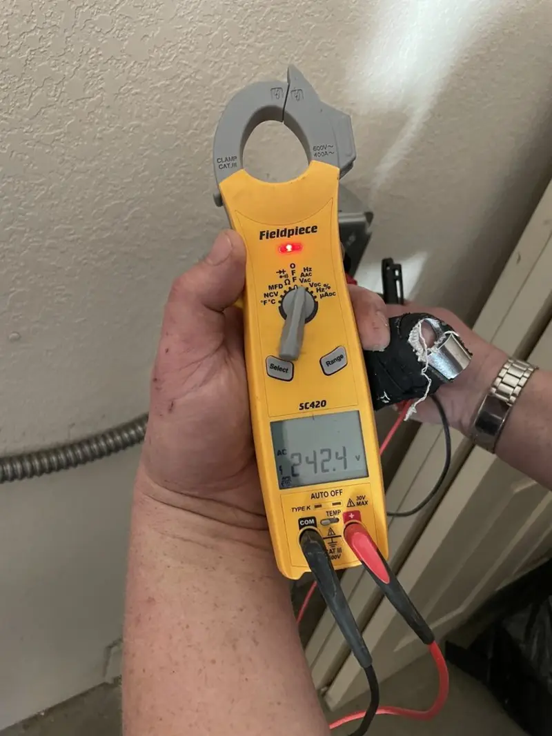 Voltage testing with clamp meter during Generator Installation in Helotes